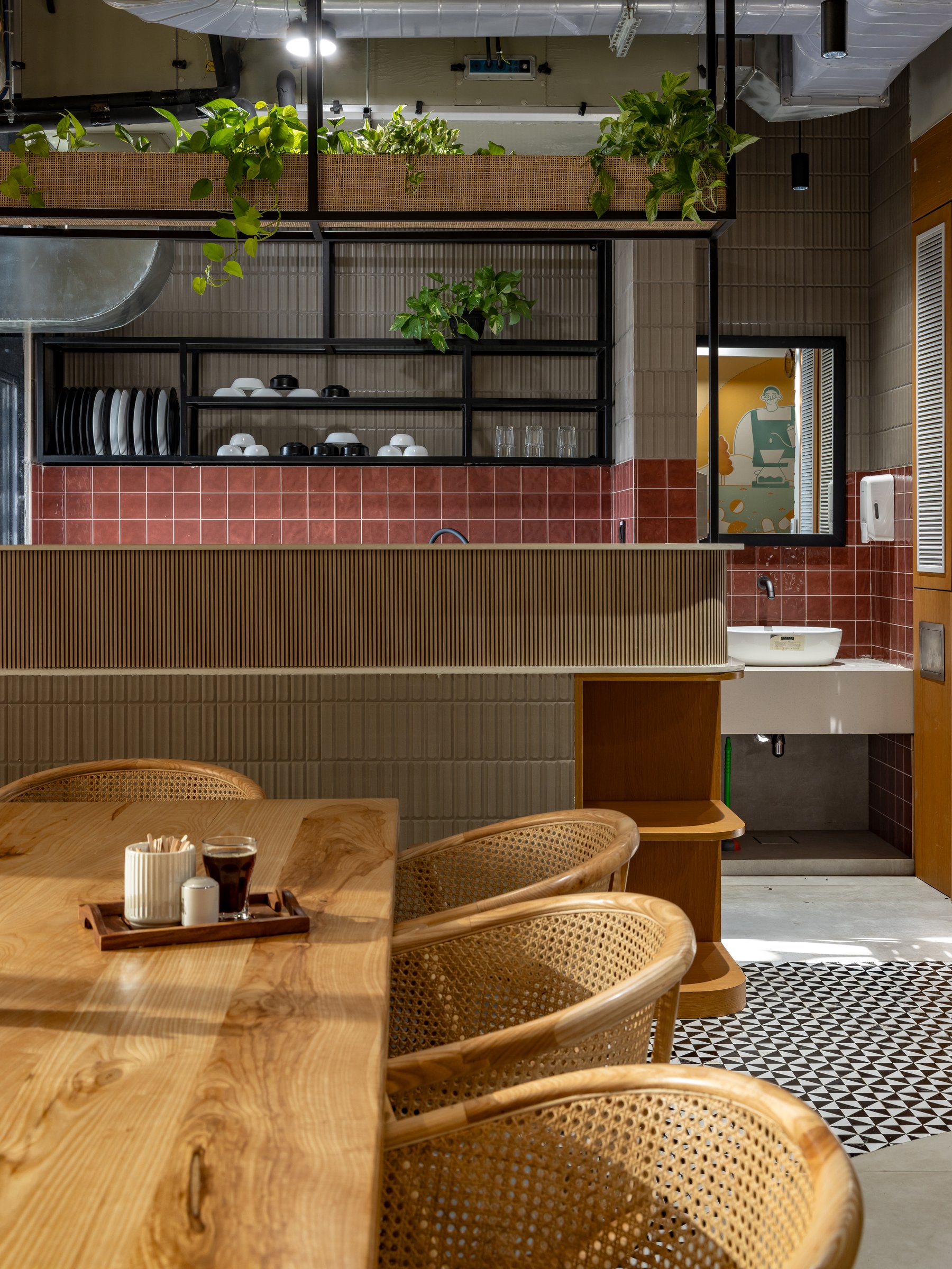 The service counter, detailed with the seriousness of a neighbourhood cafe