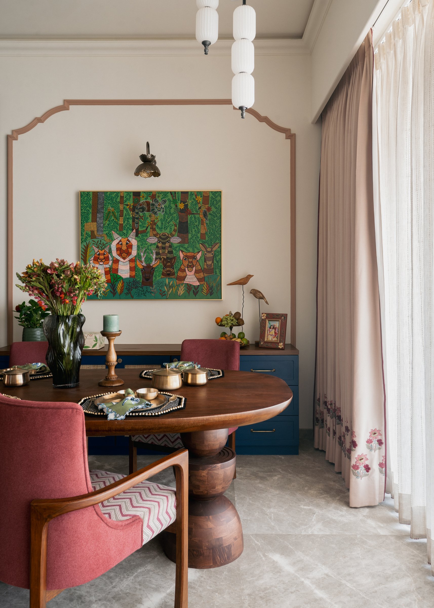 A second view of the dining area, where the tablescape is set as though for the day rather than the photograph