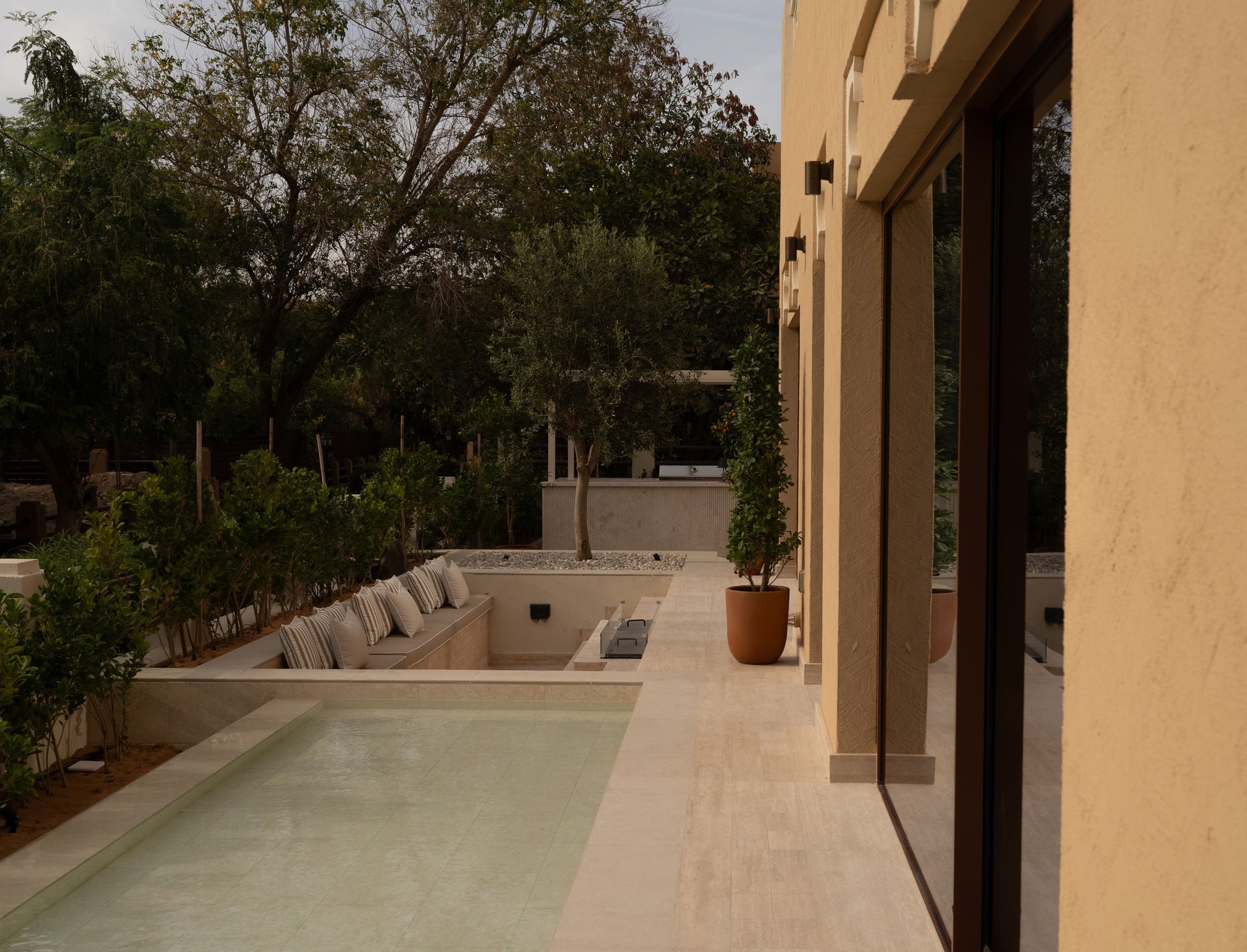 An interior moment from a Design Edit project, where natural stone, warm timber tones, and considered joinery establish the studio’s material vocabulary