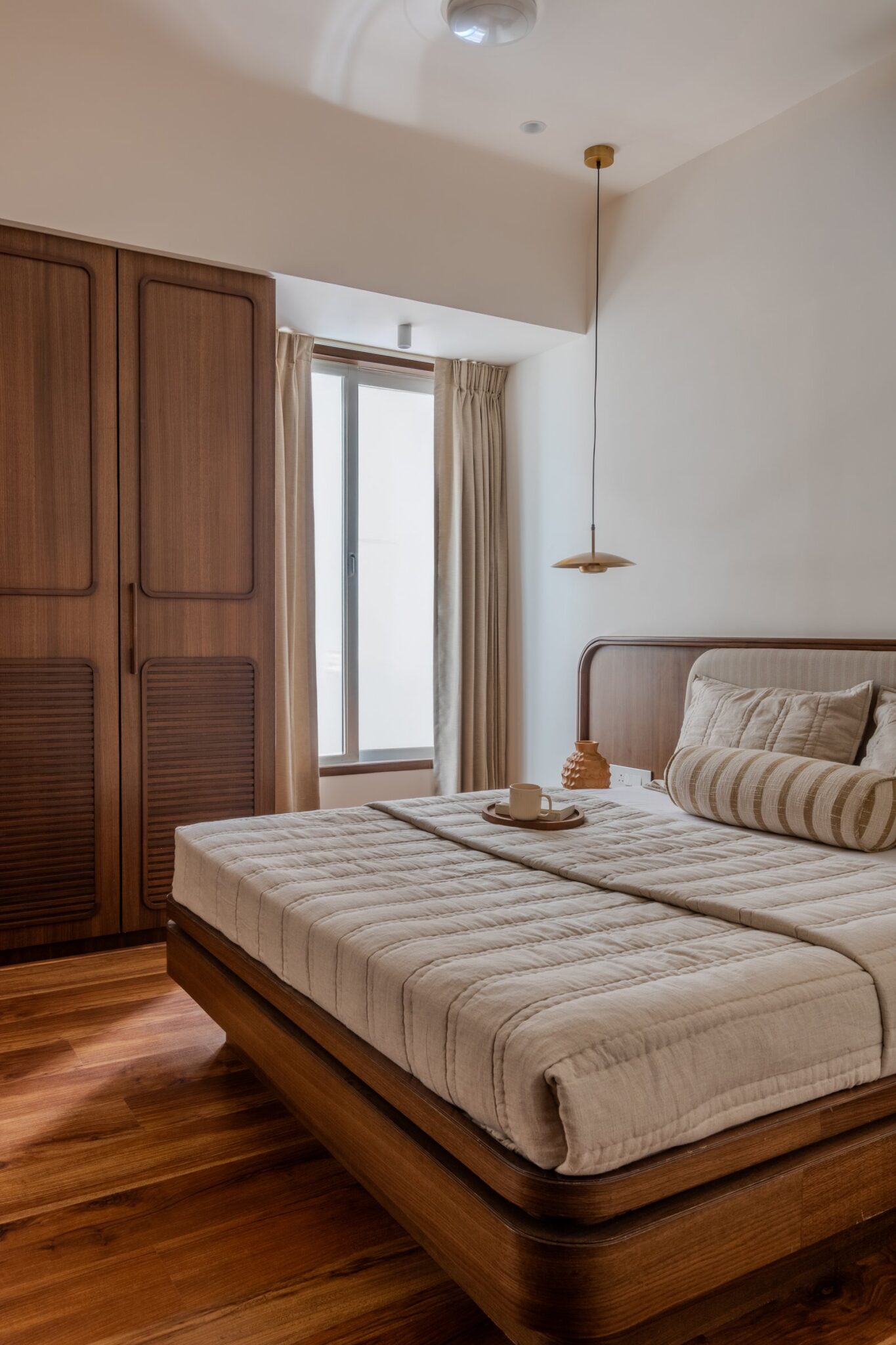 Veneer House: Curves and Warm Wood Shape a Compact Pune Home, interior design by VSA Design Studio in Kothrud, Pune