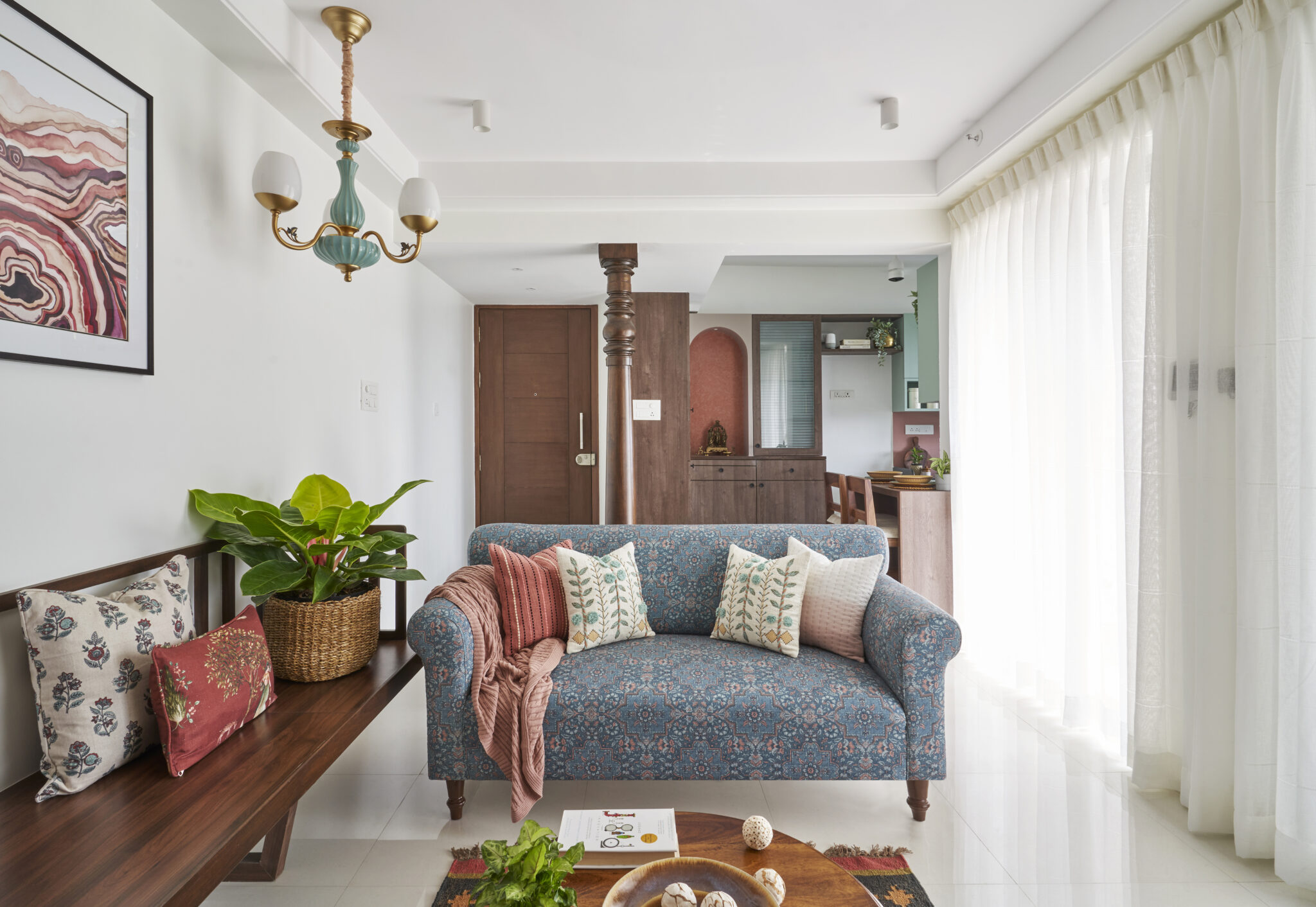 A hint of traditional elements with an earthy palette for this 730 Sqft Pune apartment, designed by INI Studio — INI Design Studio, Pune