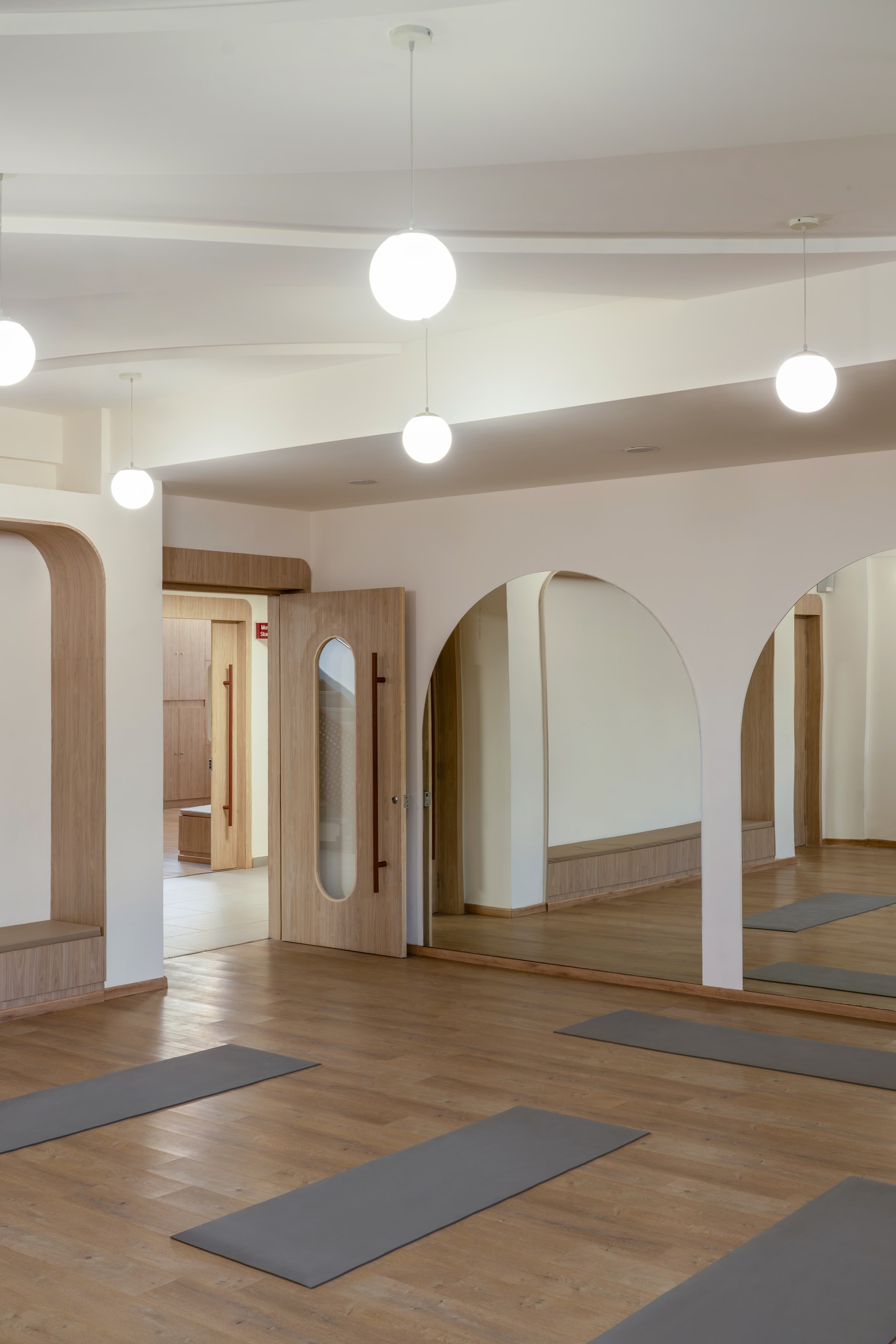 Interior view 8 — The Navriti School: A Campus Defined by Circles, Arches and Deep Red
