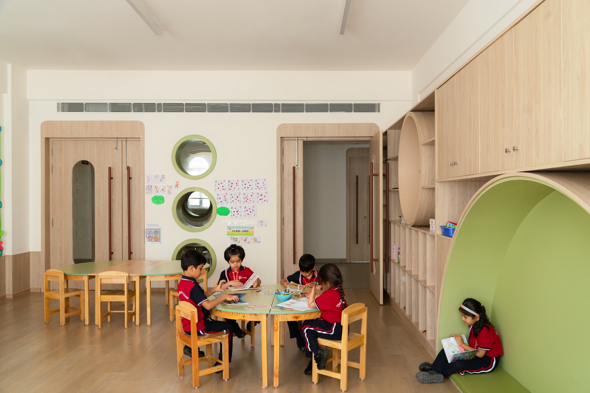 Interior view 4 — The Navriti School: A Campus Defined by Circles, Arches and Deep Red