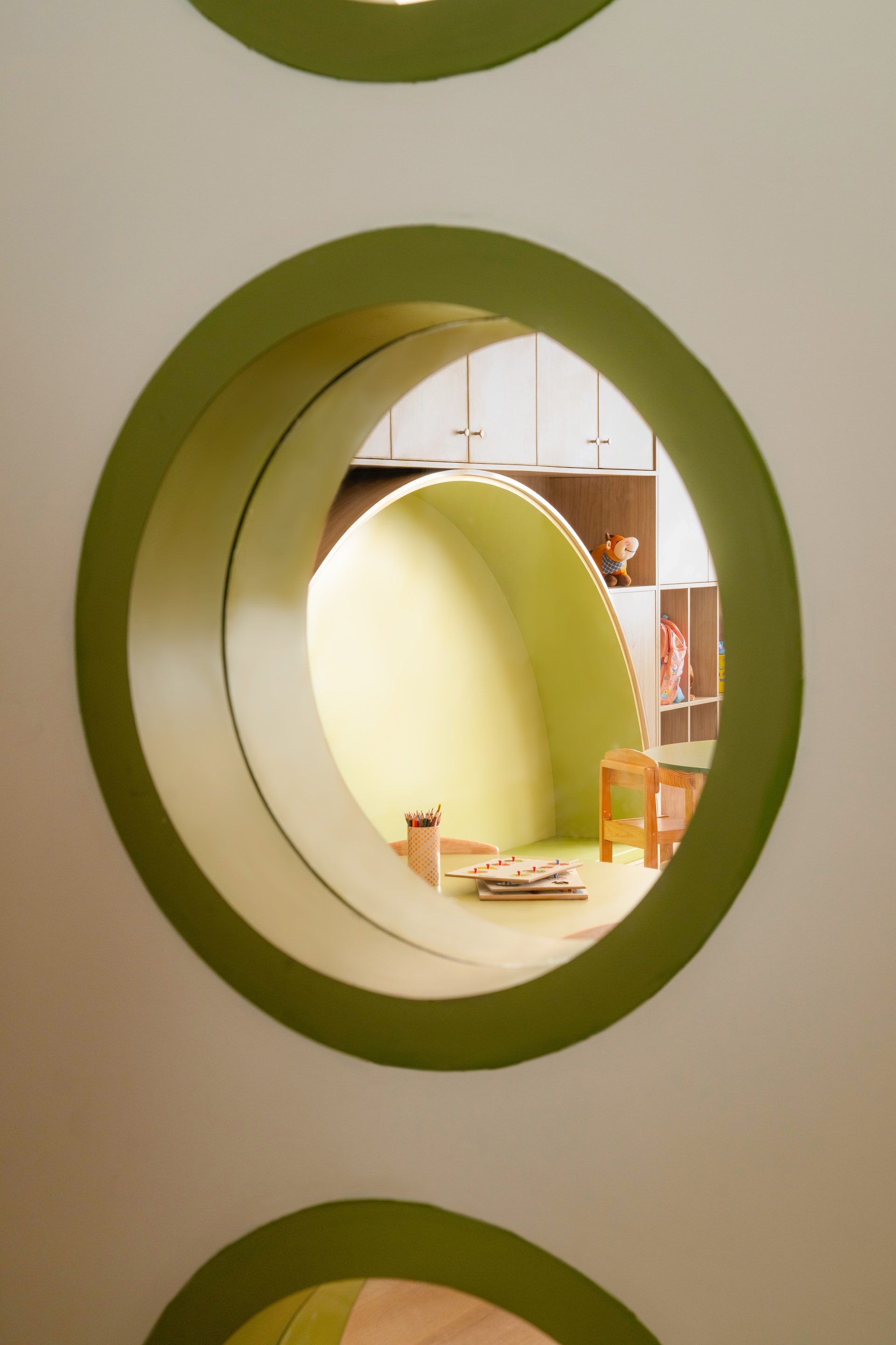 Interior view 3 — The Navriti School: A Campus Defined by Circles, Arches and Deep Red
